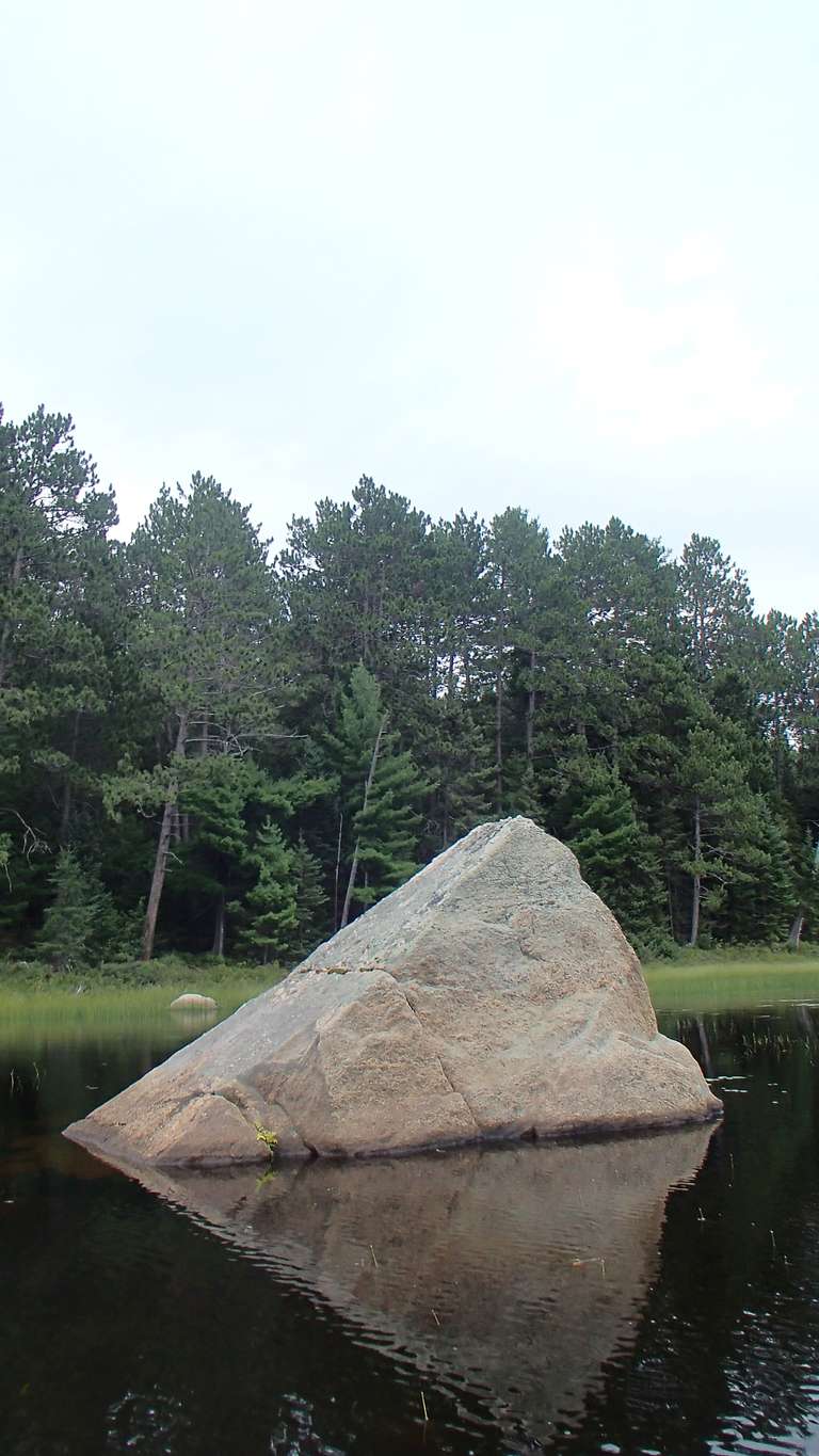 Rock shaped like a pyramid on May Lake