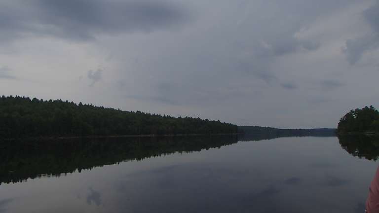 A very calm and very dark Grand Lake